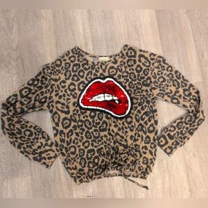 Leopard print sweater w/sequin mouth accent